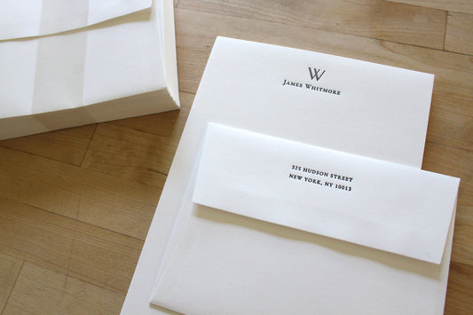 Personalized letterpress stationery with architectural initial and matching envelope