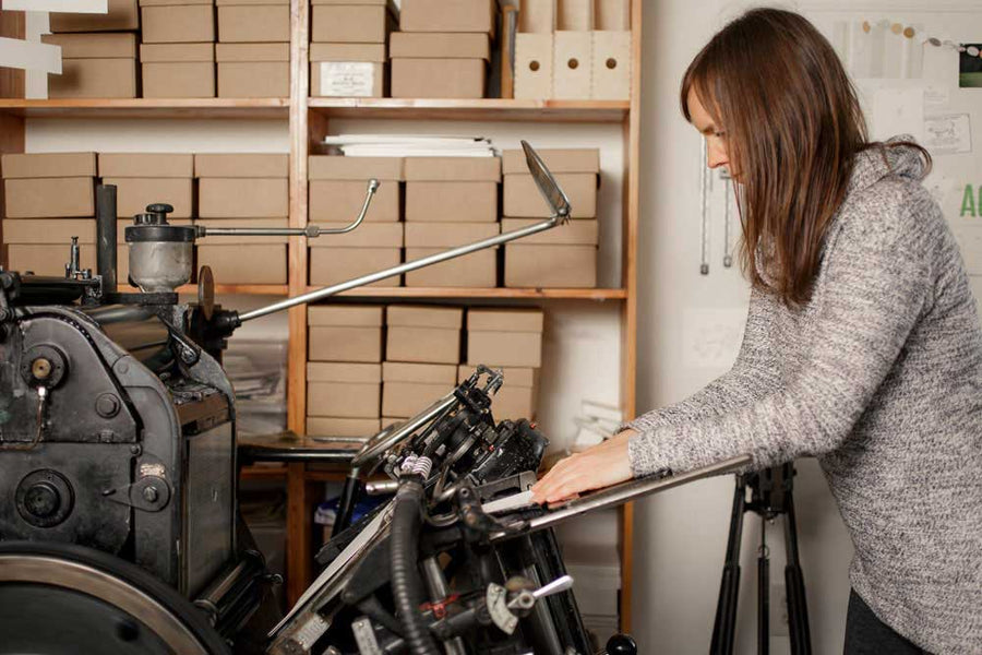 Wide view of Moontree Letterpress studio with cotton paper and presses