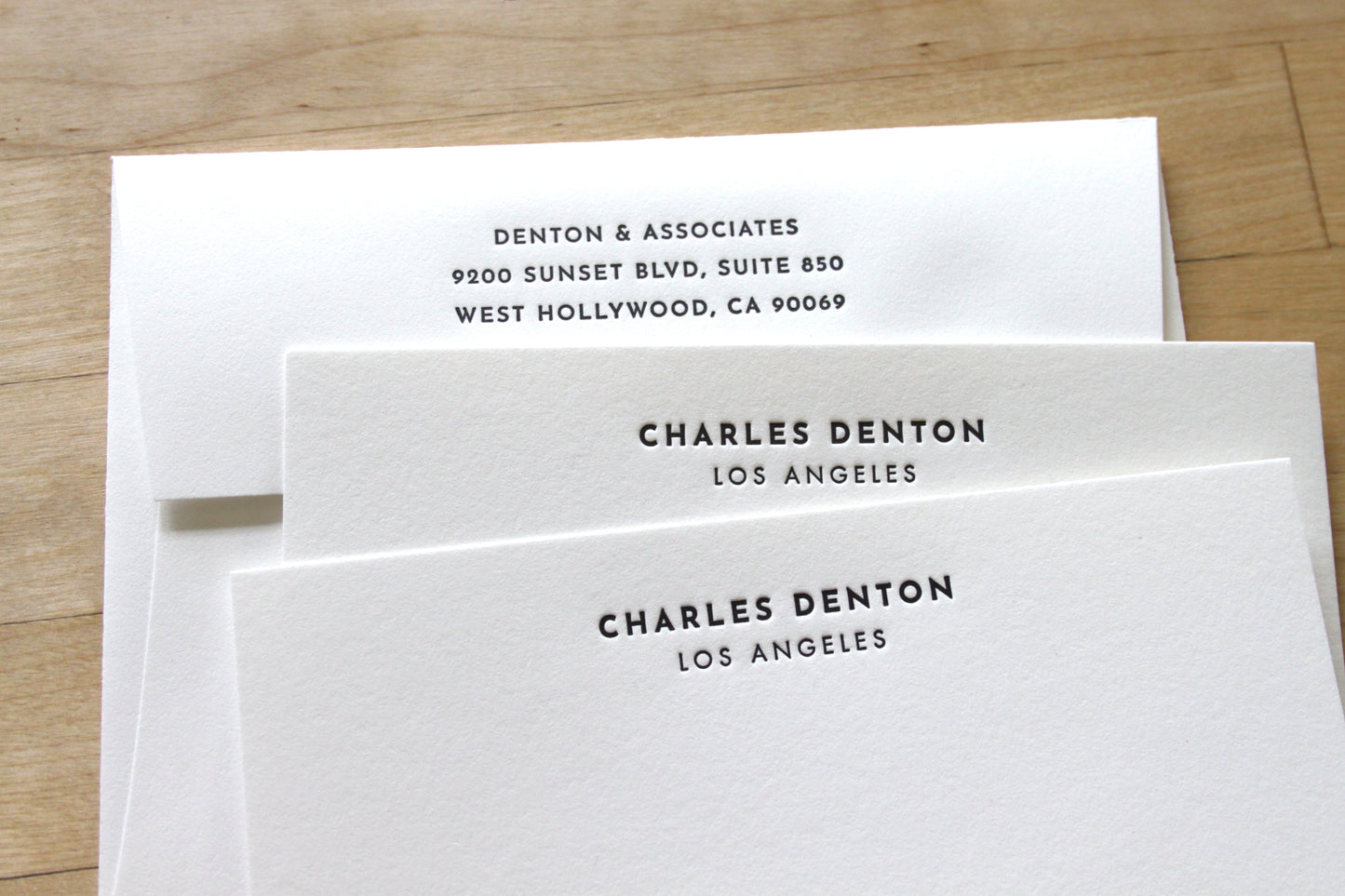 Bold headline letterpress business stationery personalized with name and city on cotton paper