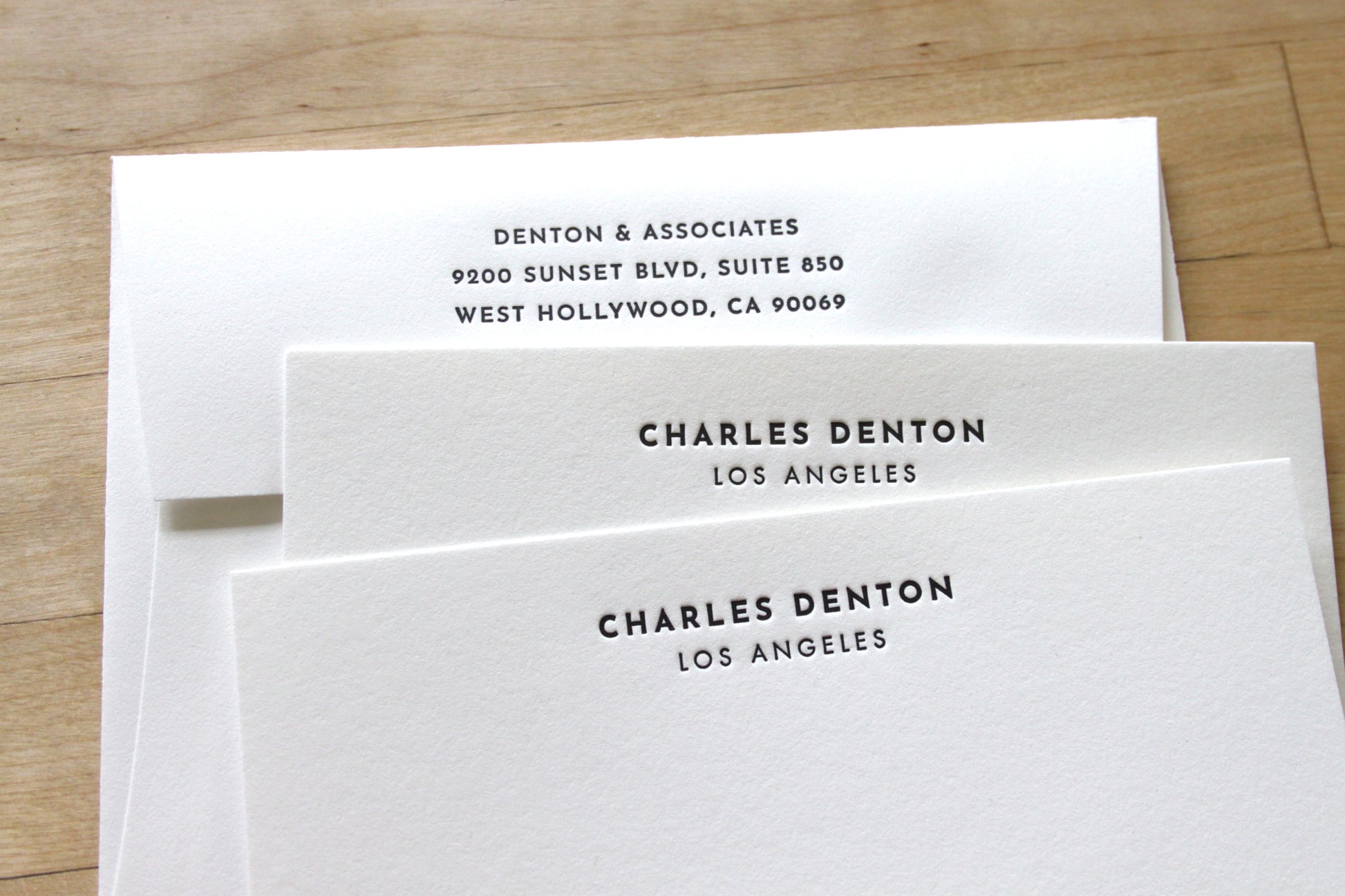 Bold headline letterpress business stationery personalized with name and city on cotton paper