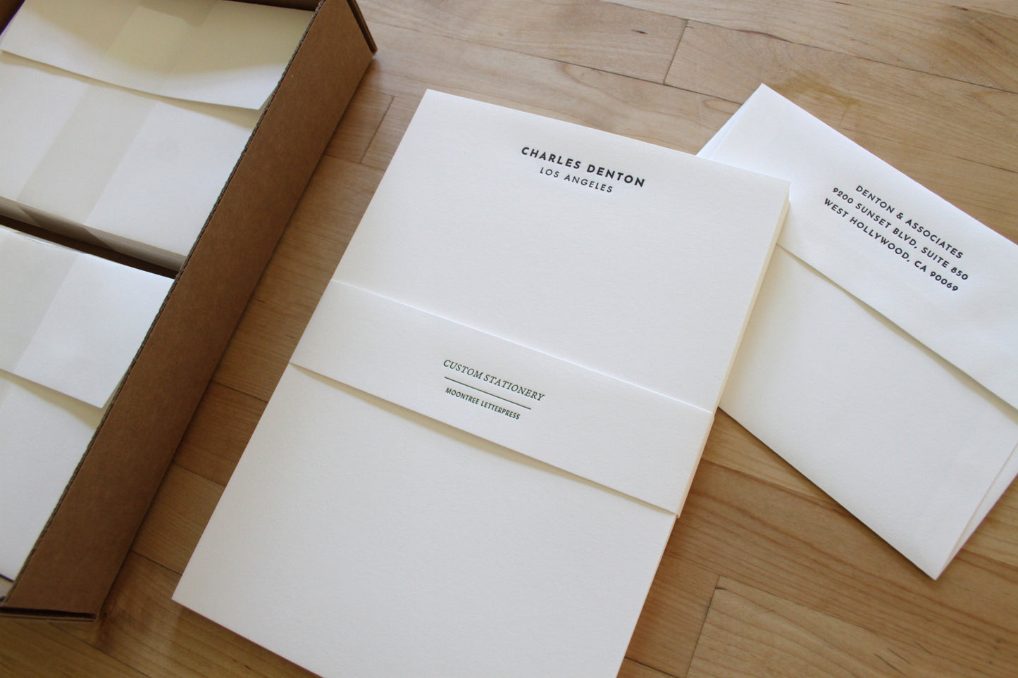 Modern bold letterpress stationery with name and city, packaged with matching business return-address envelope