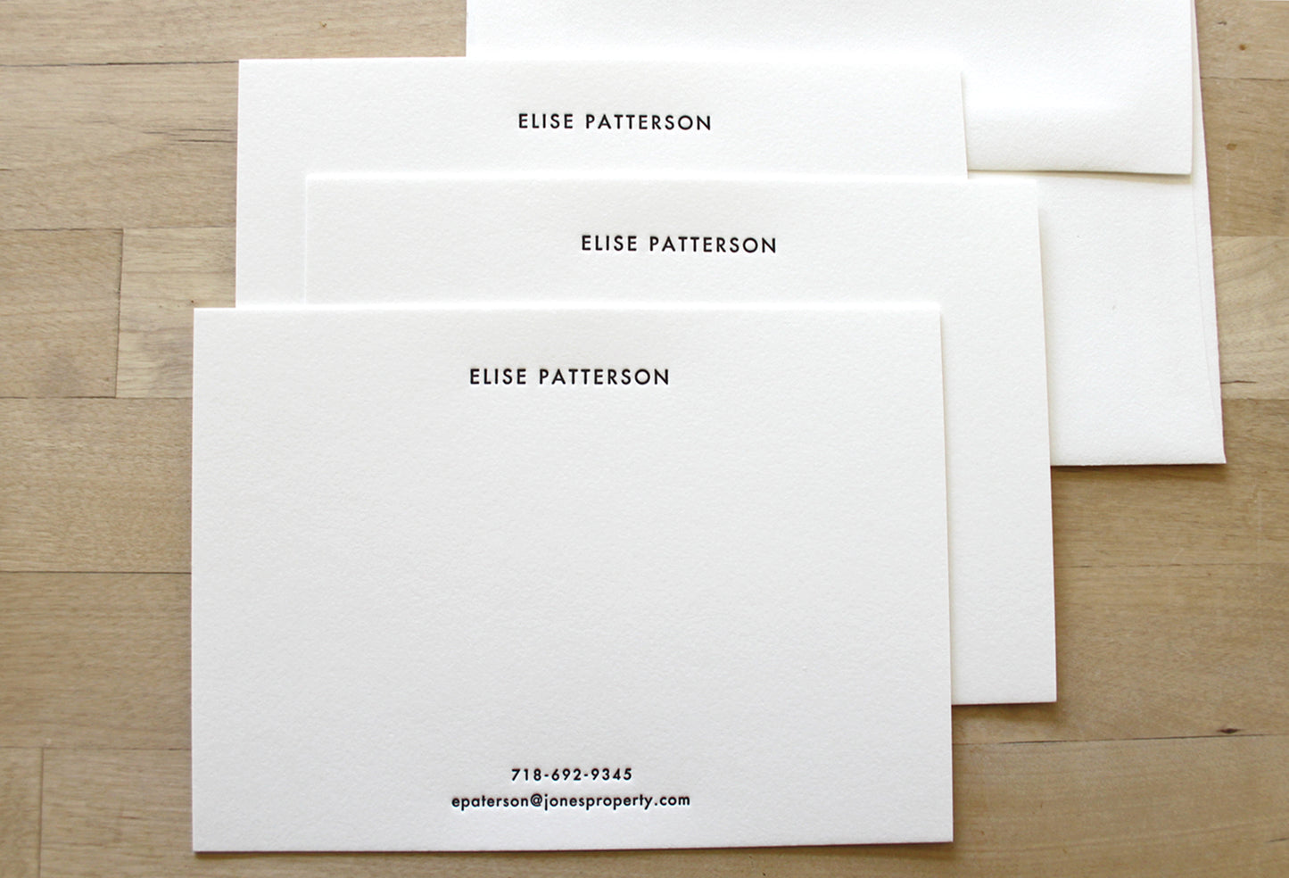 Modern Stacked Center personalized letterpress stationery in Futura font on premium cotton paper
