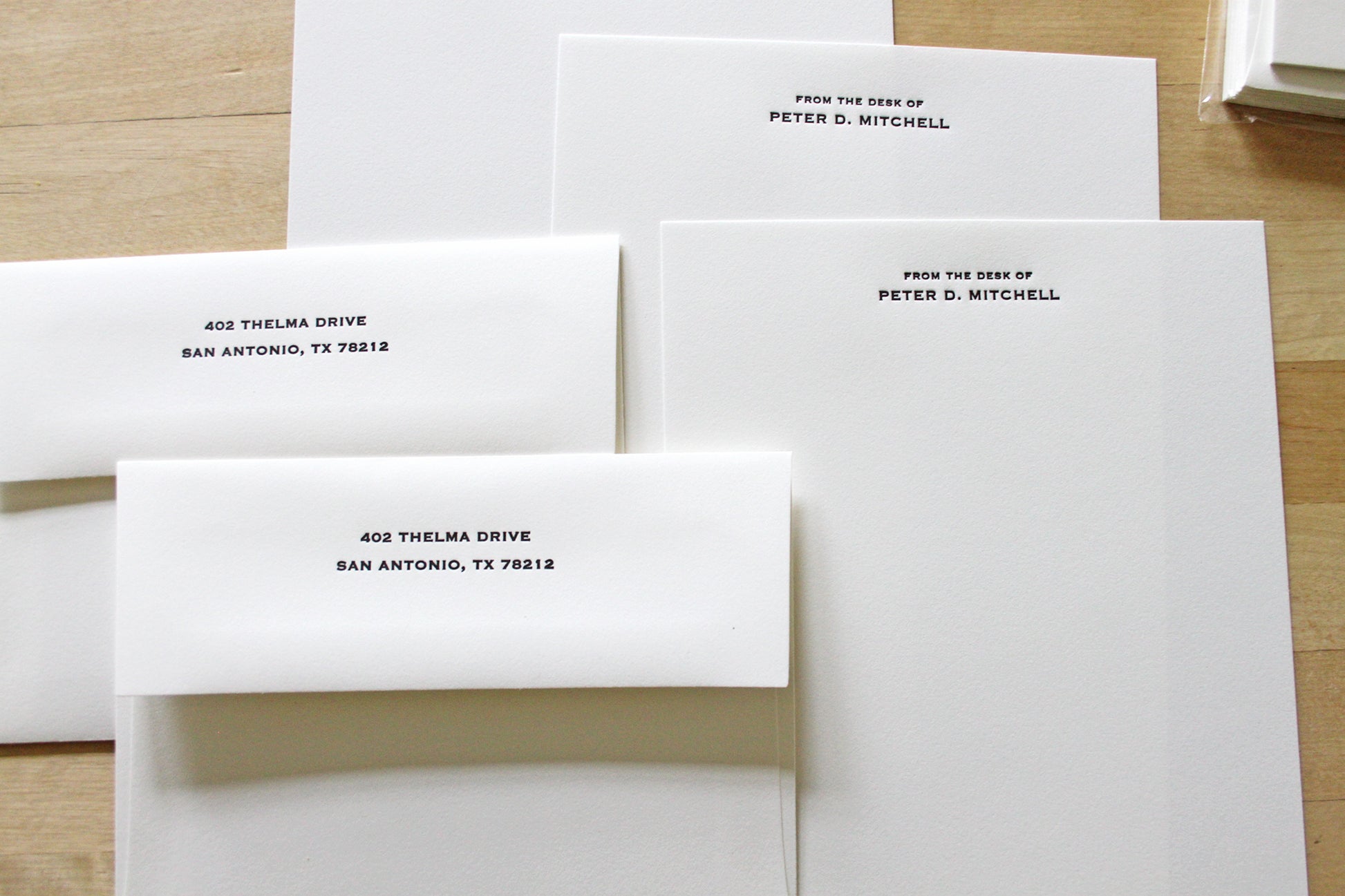 Professional letterpress stationery sheets with name printed on cotton paper, with matching envelope