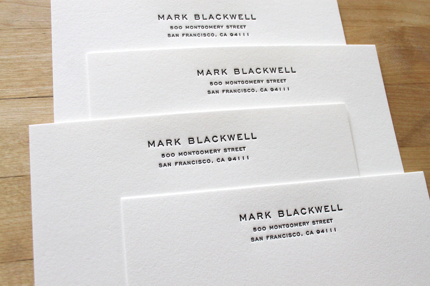 Professional letterpress business notecard with matching return-addressed envelope, personalized with name and San Francisco address