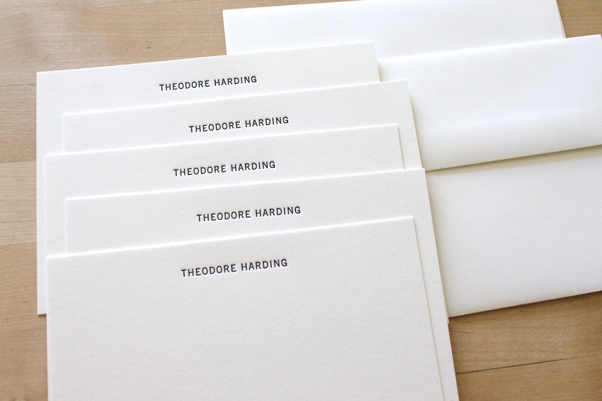 Sans serif personalized letterpress stationery with name and address, printed on recycled cotton paper